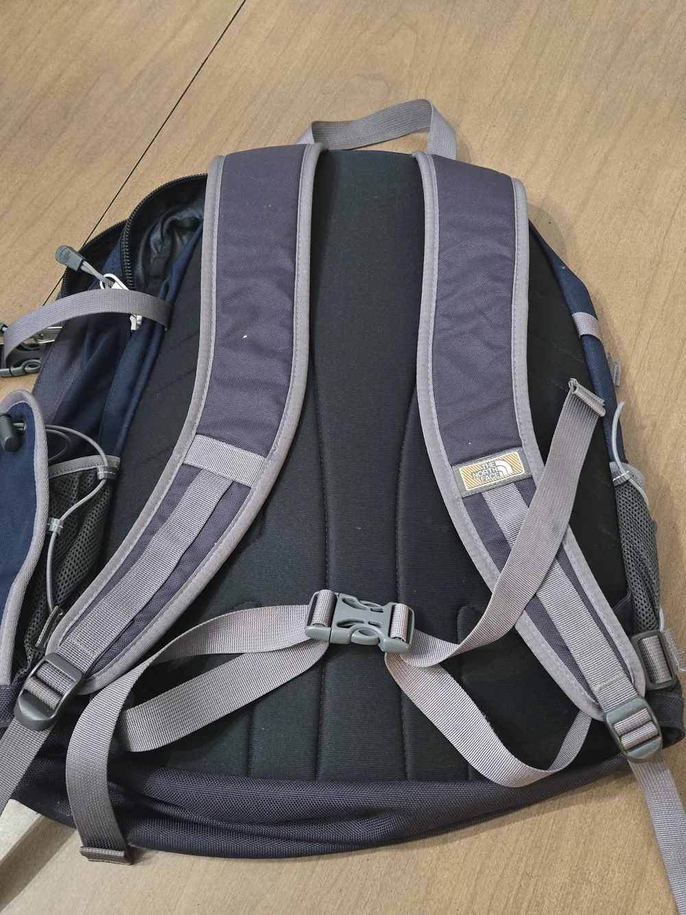 The North Face Slingshot Backpack in Navy and Charcoal